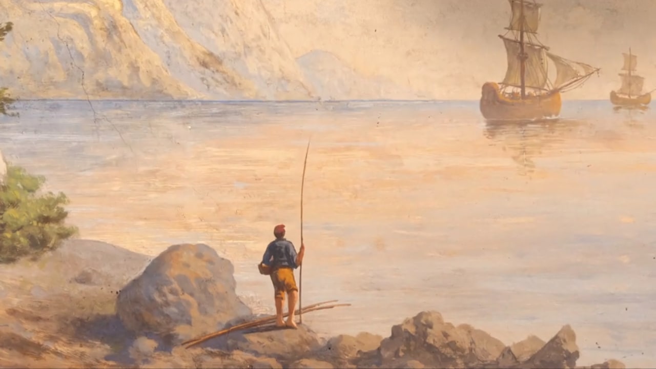 Painting of a guy wearing a red cap, standing on big rocks near the water. Basket in one hand, holding what looks like a fishing rod in the other. Two big ships can be seen sailing away, not too far from land.