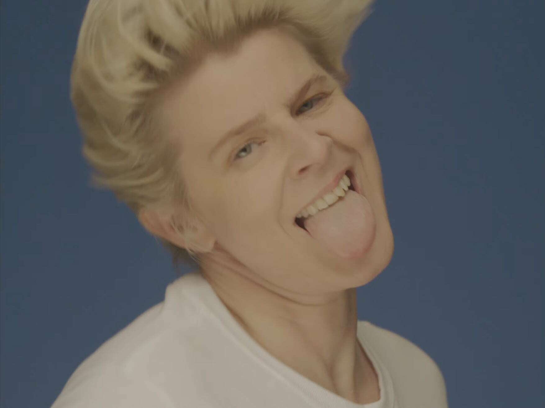 Robyn smiling with her tongue out.